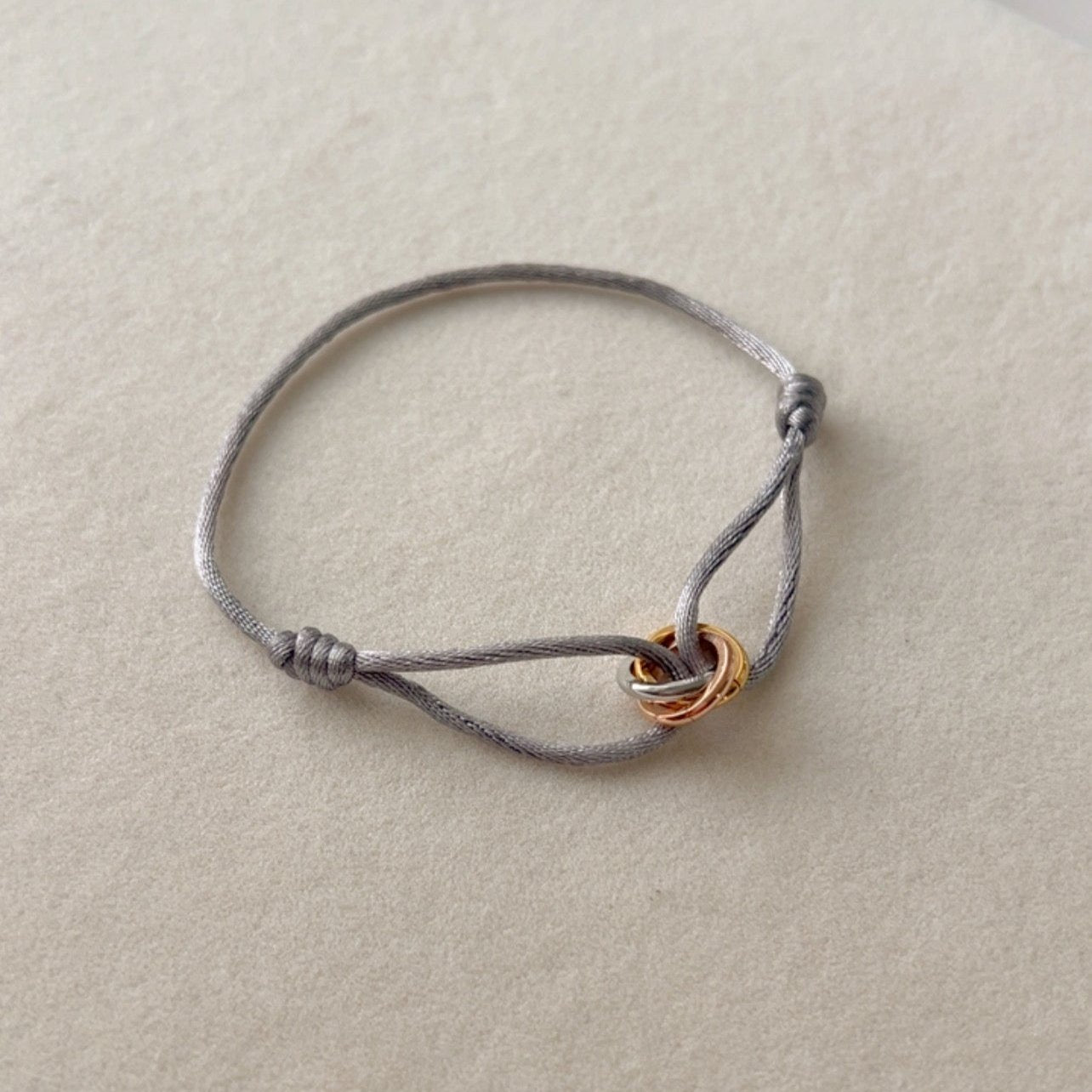 Trinity -  Bracelet  Gold, Silver and Rose Gold Rings, Adjustable Satin Cord