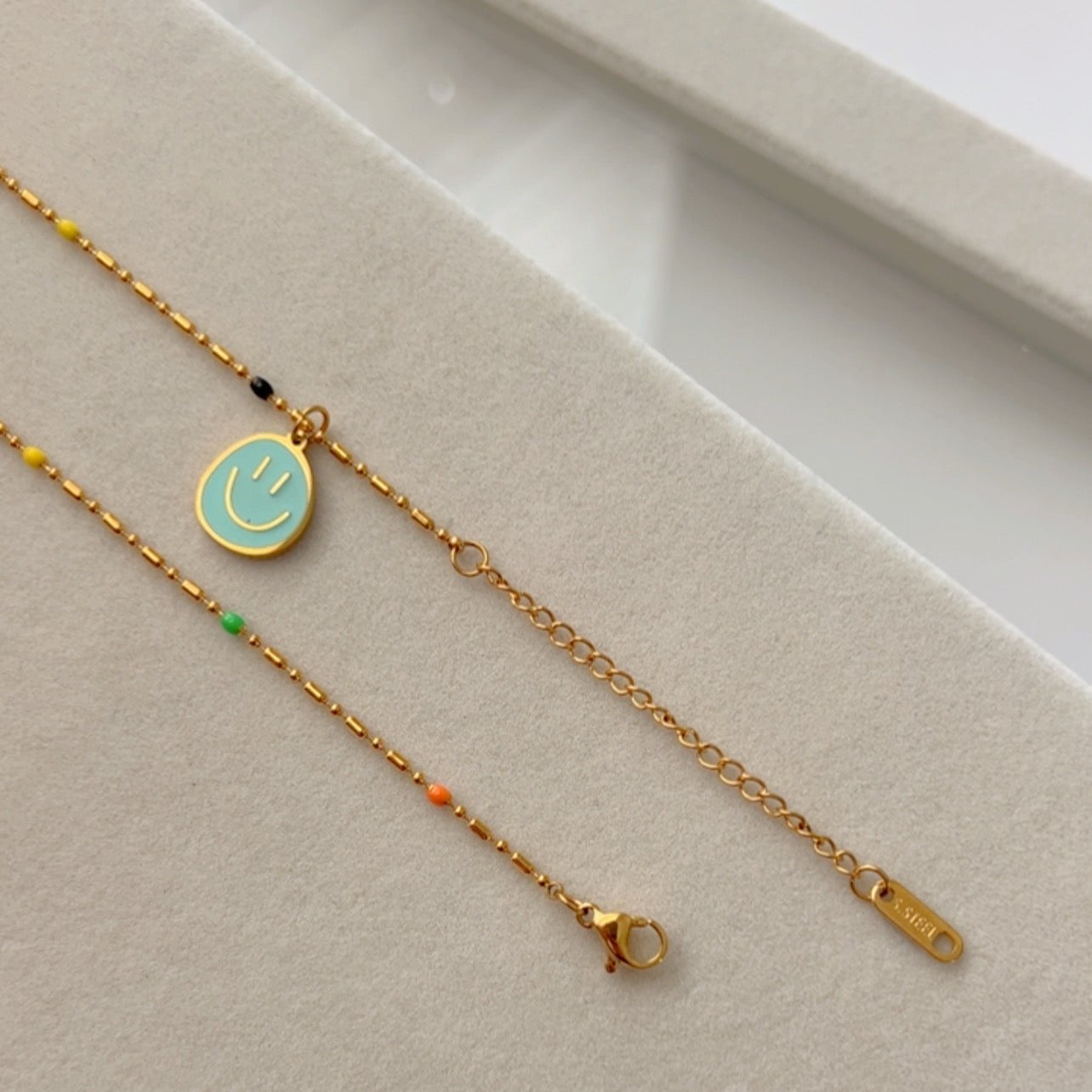 Smiley Face and Balloon Dog Pendant Necklaces