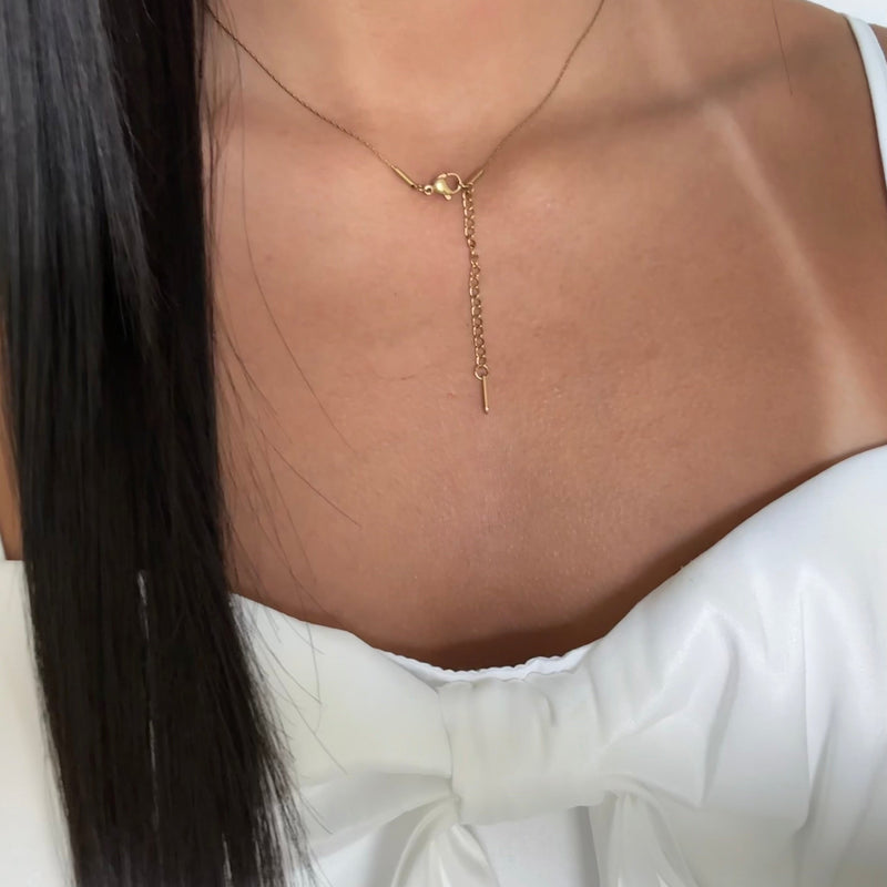 Close-up of gold heart pendant – Serena necklace, hypoallergenic and chic