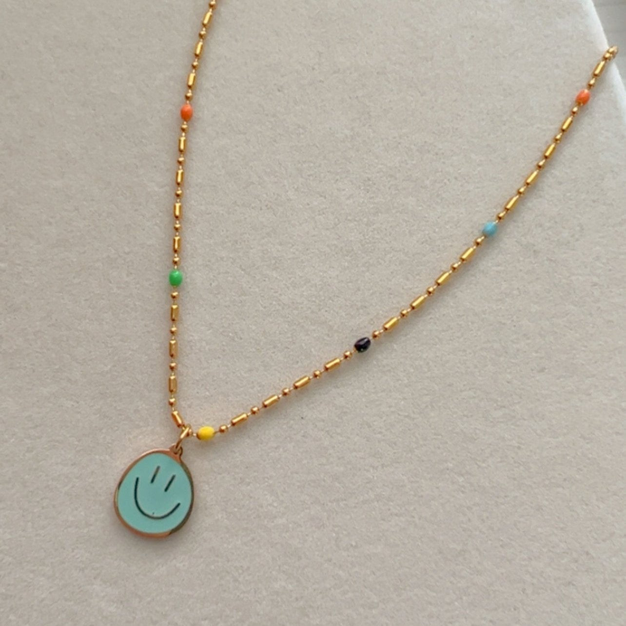 Smiley Face and Balloon Dog Pendant Necklaces